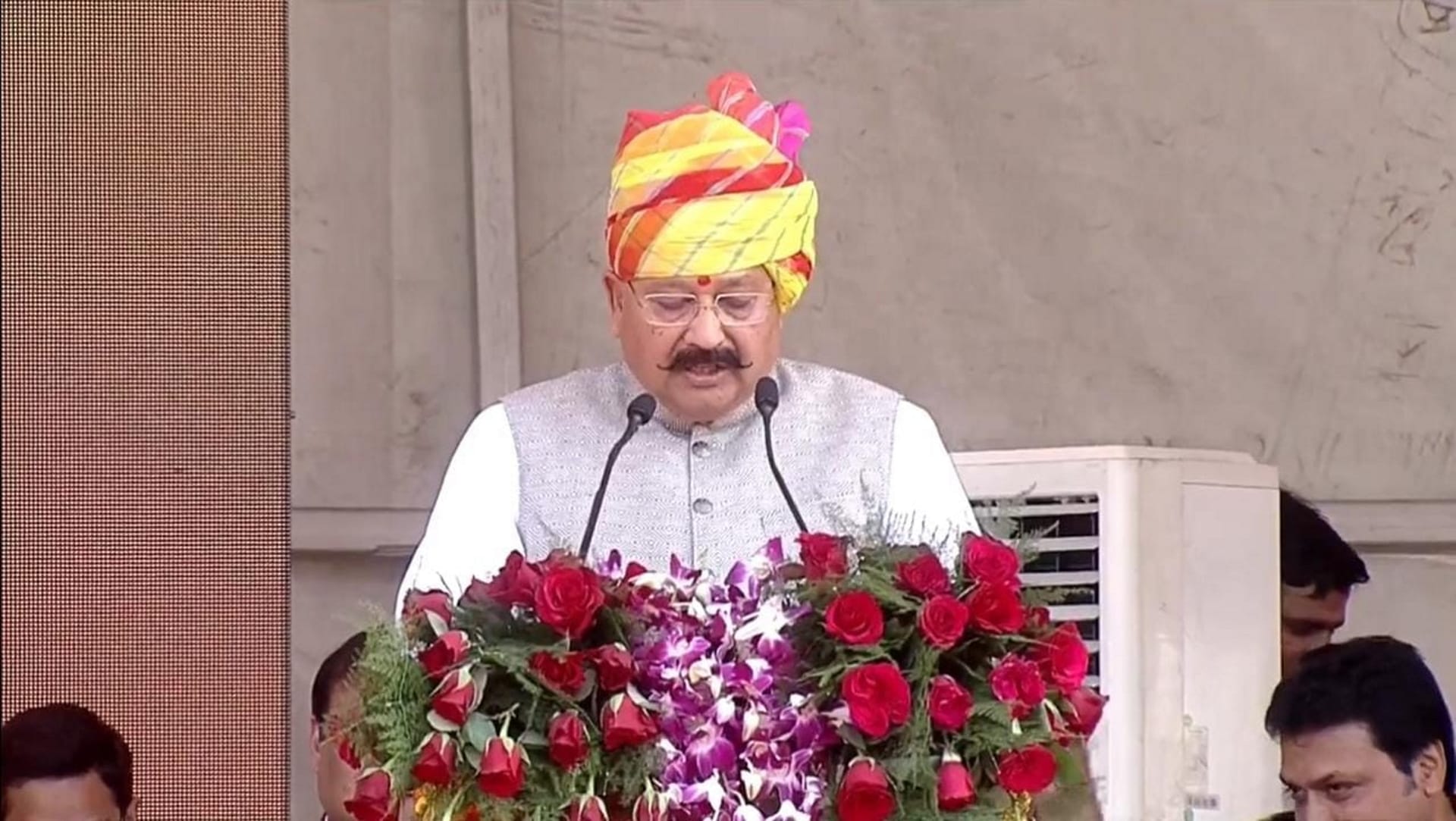 Highlights of Dhami swearing in ceremony: PM Modi Cabinet ministers Rekha Arya and Satpal Maharaj remained in discussion