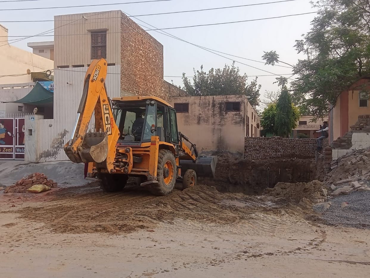Eight feet high security wall of disposal tank collapses