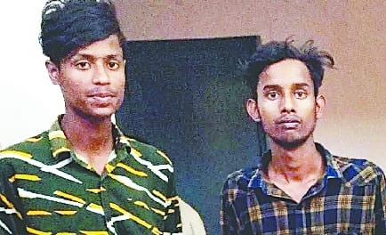 Incorrect photographs were found on the admit cards of two students