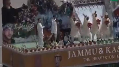 jammu kashmir tableau with posters of hurriyat leader syed ali shah Geelani and hm terrorist Burhan wani seen in Pakistan Day parade