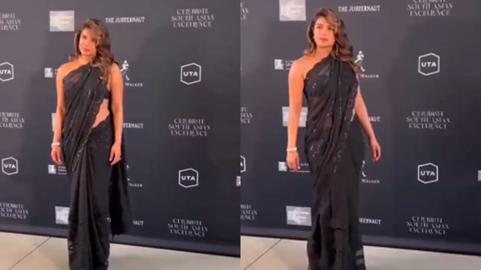 priyanka chopra turns up in black saree to host pre oscars event