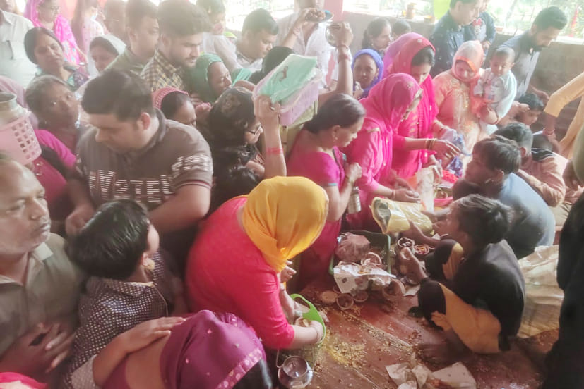 Devotees gathered to offer prasad in the fair organized at Sheetla Mata Temple