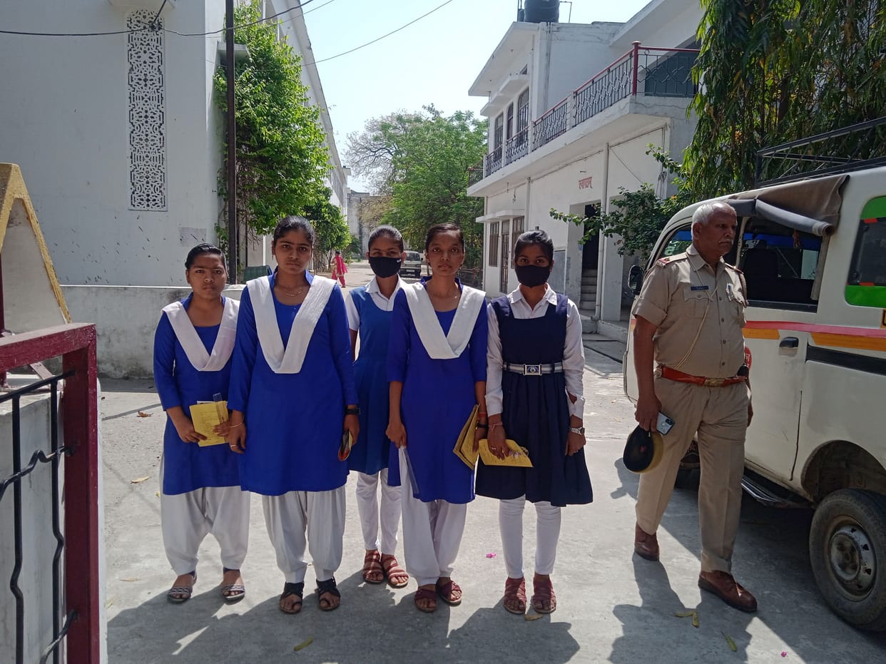 22 employees engaged in giving examination to five girl students
