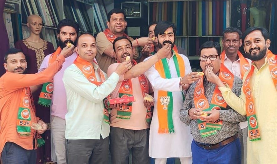Saw Yogi Adityanath's swearing-in, distributed sweets