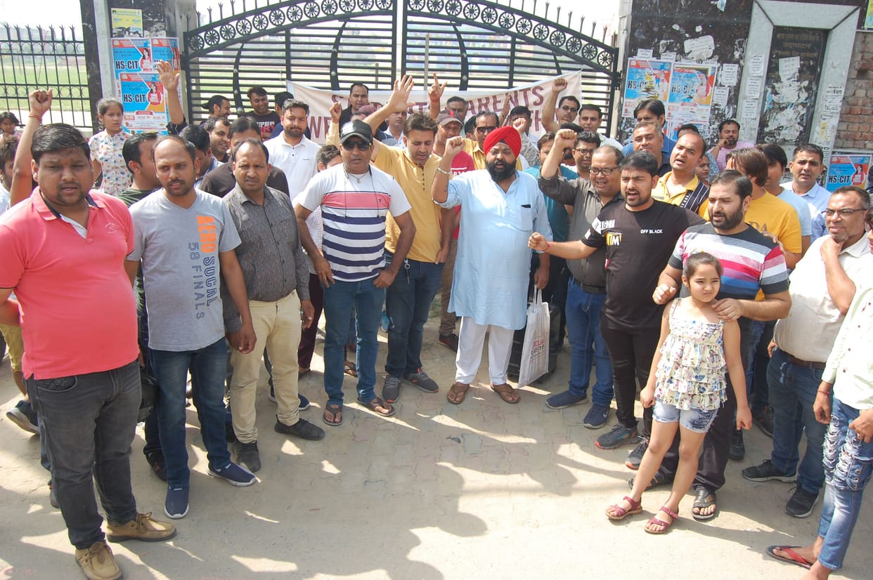 Parents furious over collection of high fees, sloganeering for access to the mini secretariat