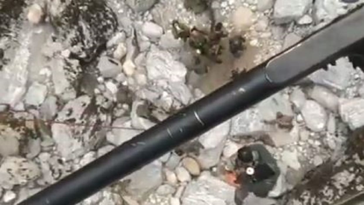watch video Indian Army Aviators conducted casualty evacuation of using winching on Advanced Light Helicopter in Sikkim Sector Eastern Theatre