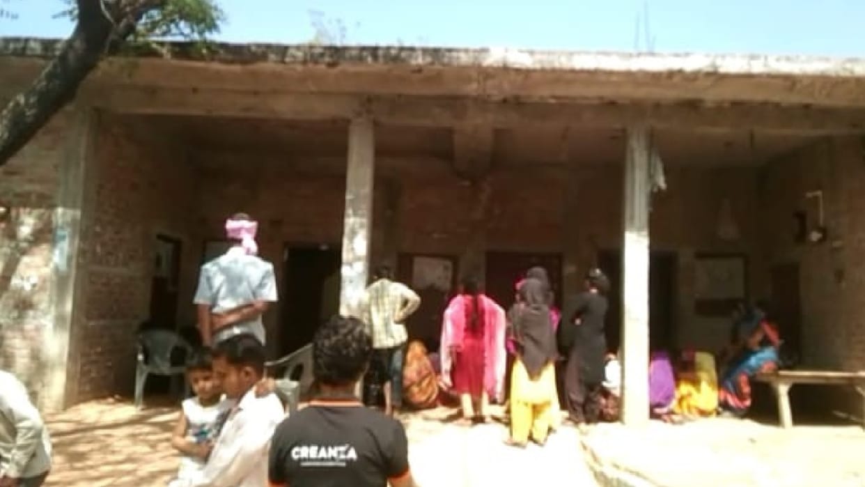 Woman murdered at home with sharp weapon