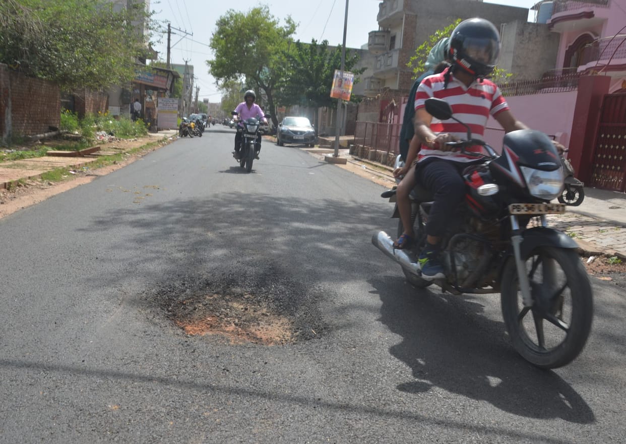 PWD built a new road with eight crores, the level of 21 sewer manholes of Public Health Department went down half a foot