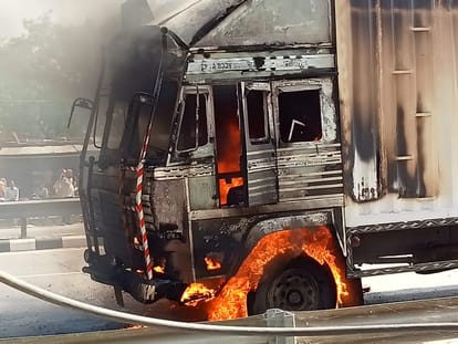 road accident national highway in Varanasi huge fire broke out in moving truck container many cattle died due to scorching
