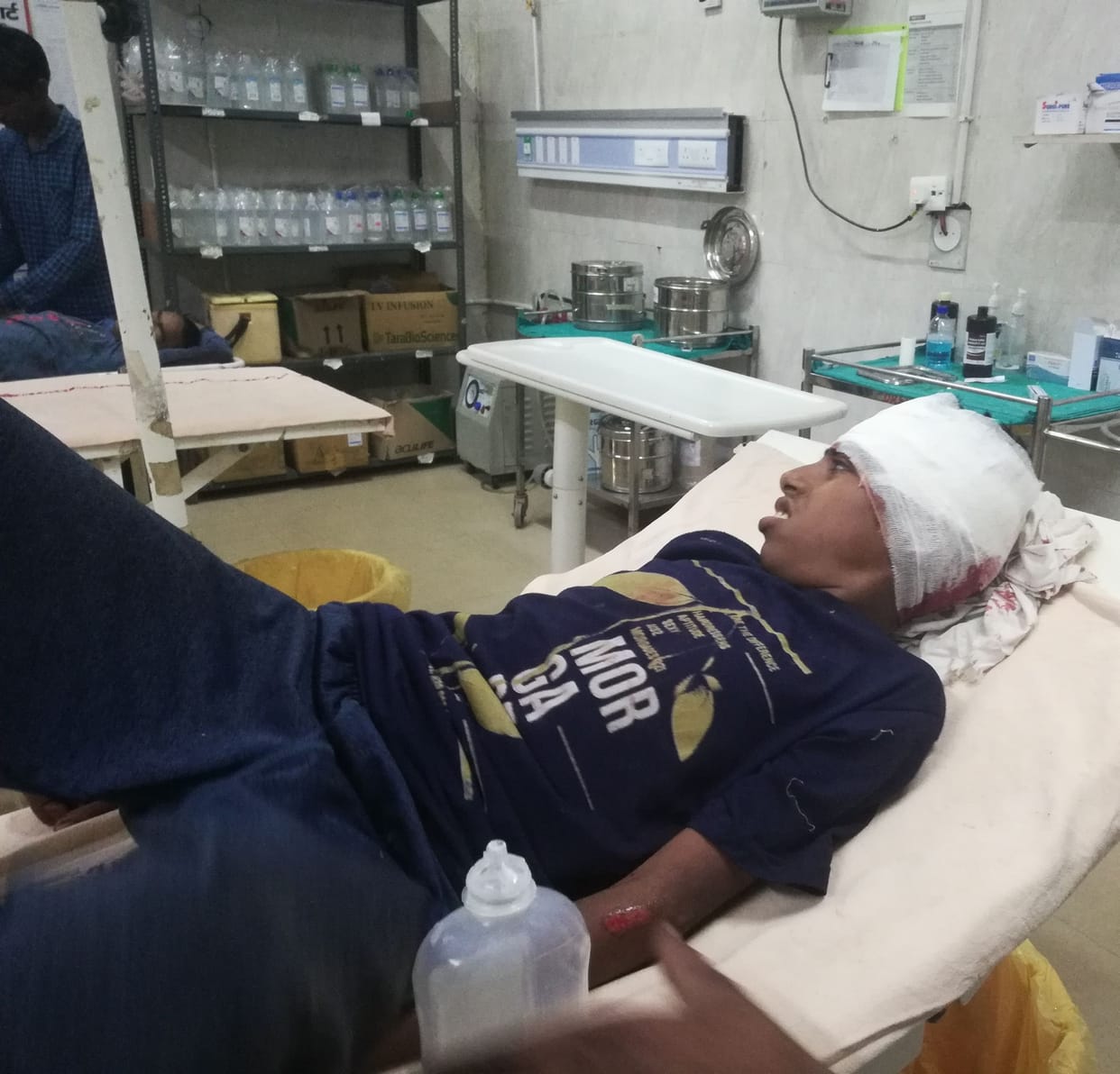 Two teenagers riding a bicycle injured after being hit by a dumper