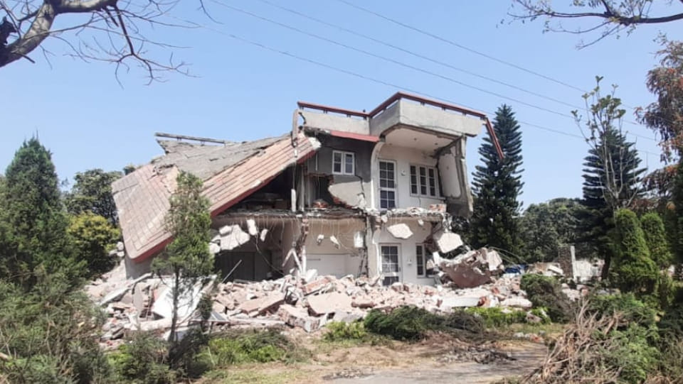 jammu district administration drive against illegal construction, former minister Taj Mohiuddin house broken