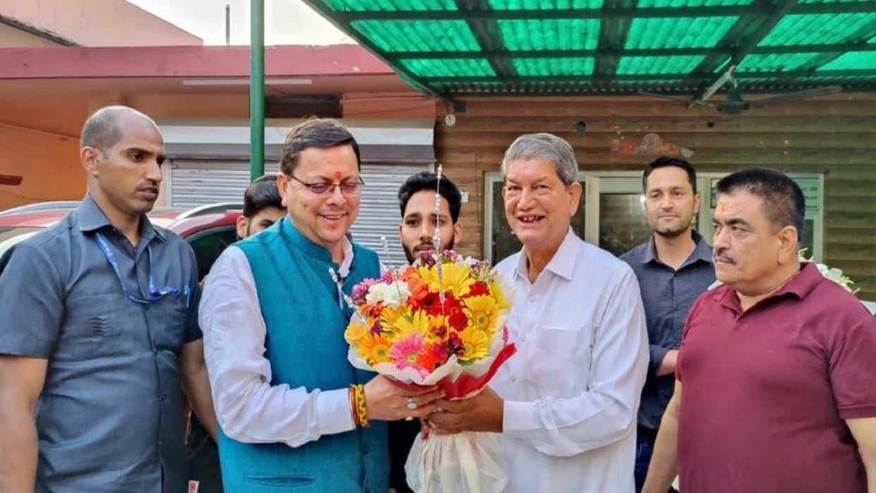 Uttarakhand: Newly elected Chief Minister Pushkar Singh Dhami meets Harish Rawat former CM did not attend the swearing-in