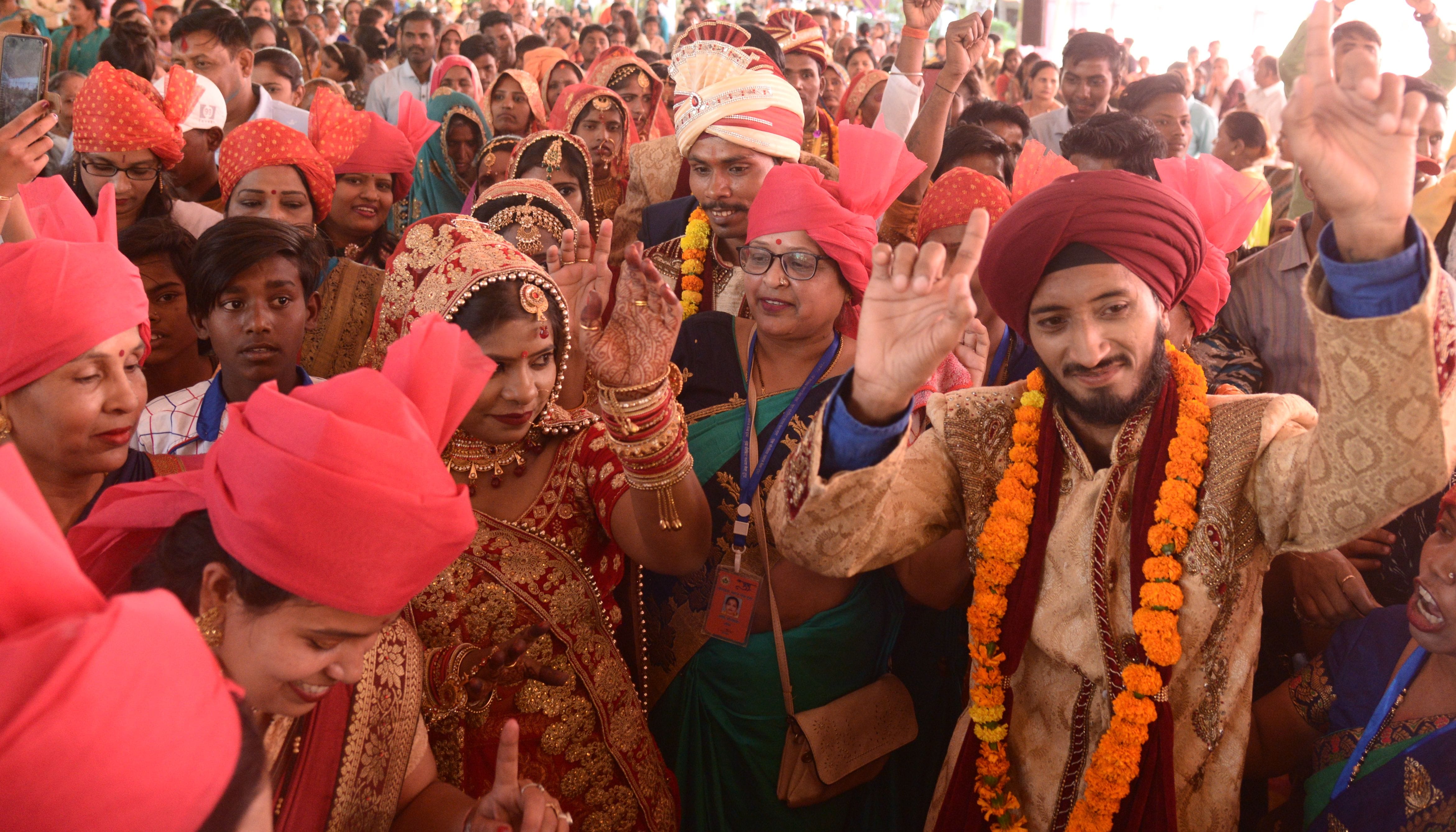 Prayagraj: Bulldozer gifted to newlyweds in mass marriage