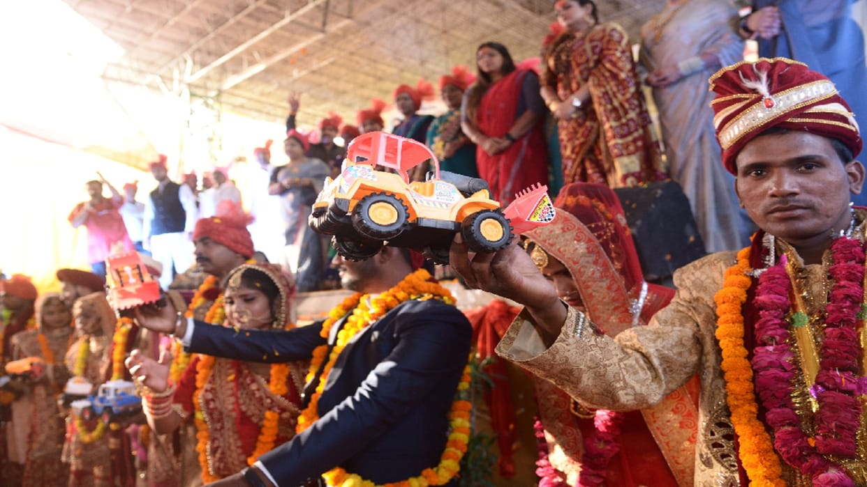 Prayagraj: Bulldozer gifted to newlyweds in mass marriage
