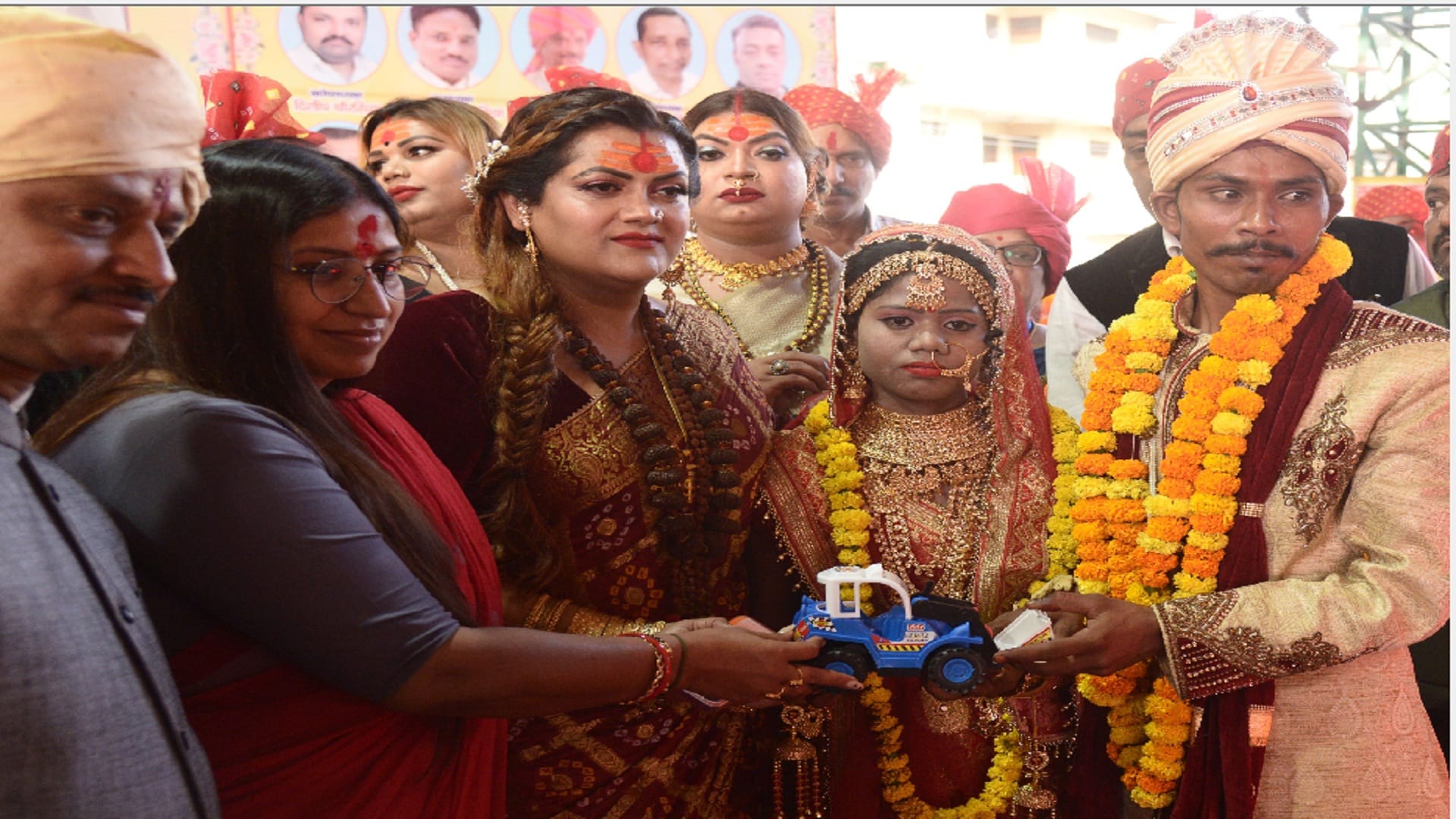 Prayagraj: Bulldozer gifted to newlyweds in mass marriage