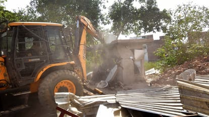 Bulldozer roared again at former MP Atiq Ahmed house boundary wall was demolished