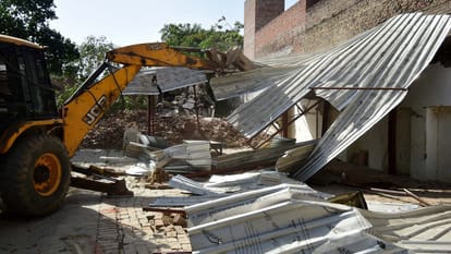 Bulldozer roared again at former MP Atiq Ahmed house boundary wall was demolished