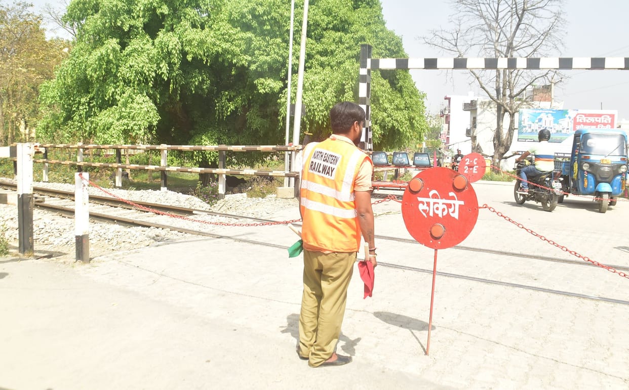 Railway crossing boom broken, tractor caught along with driver