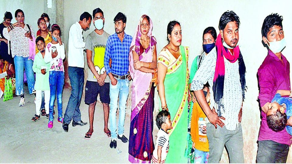 Queue of people waiting to get aadhar card in agra