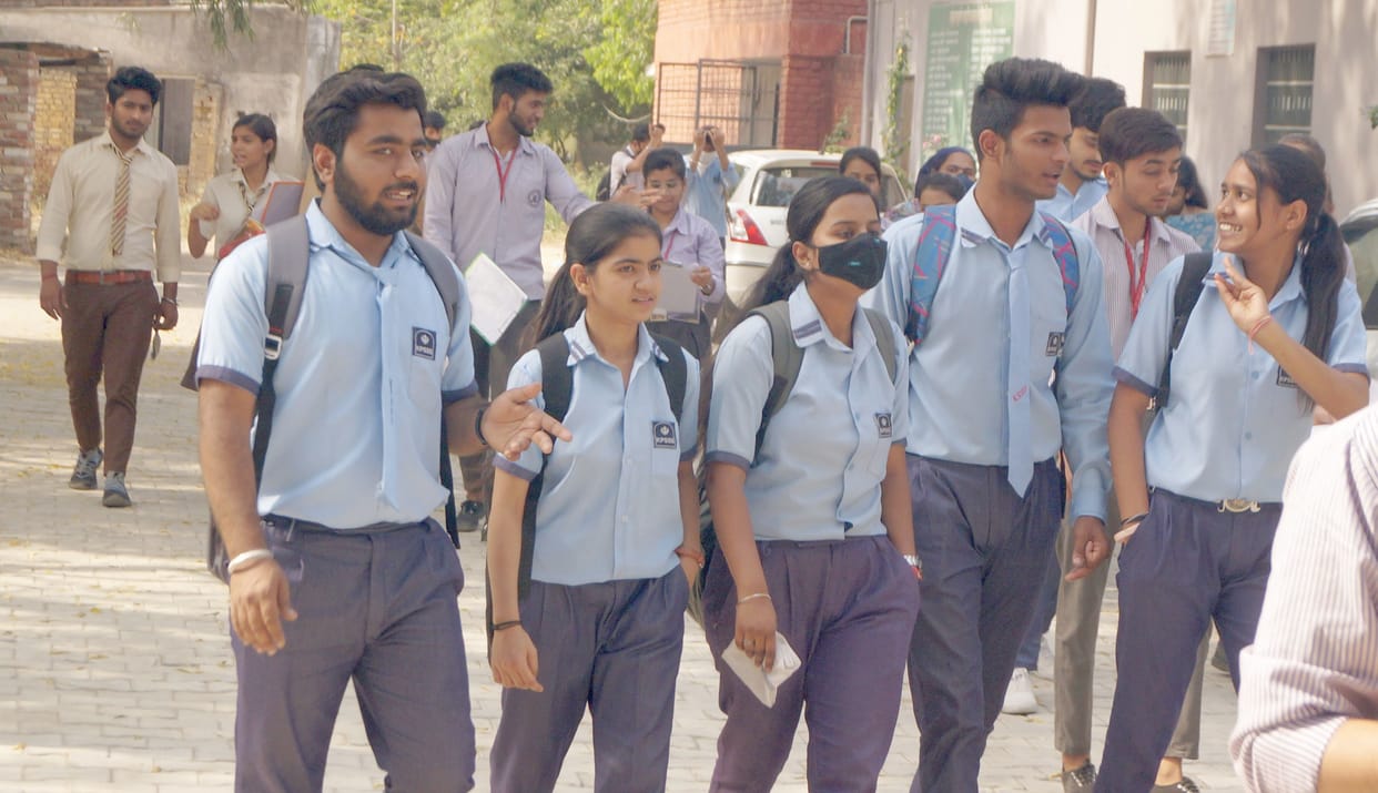 Students involved in solving subjective question paper, many students missed paper