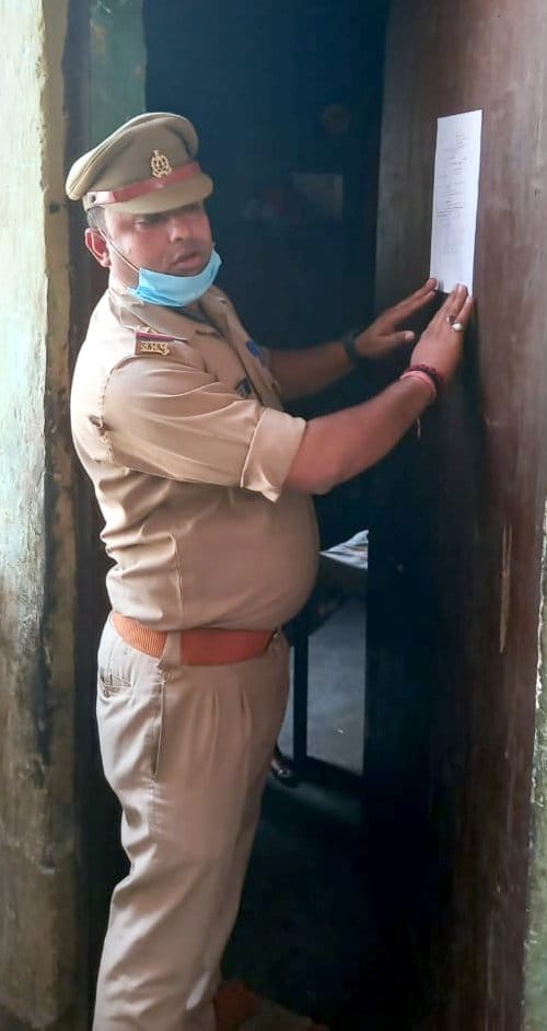Attachment notice of accused's house pasted
