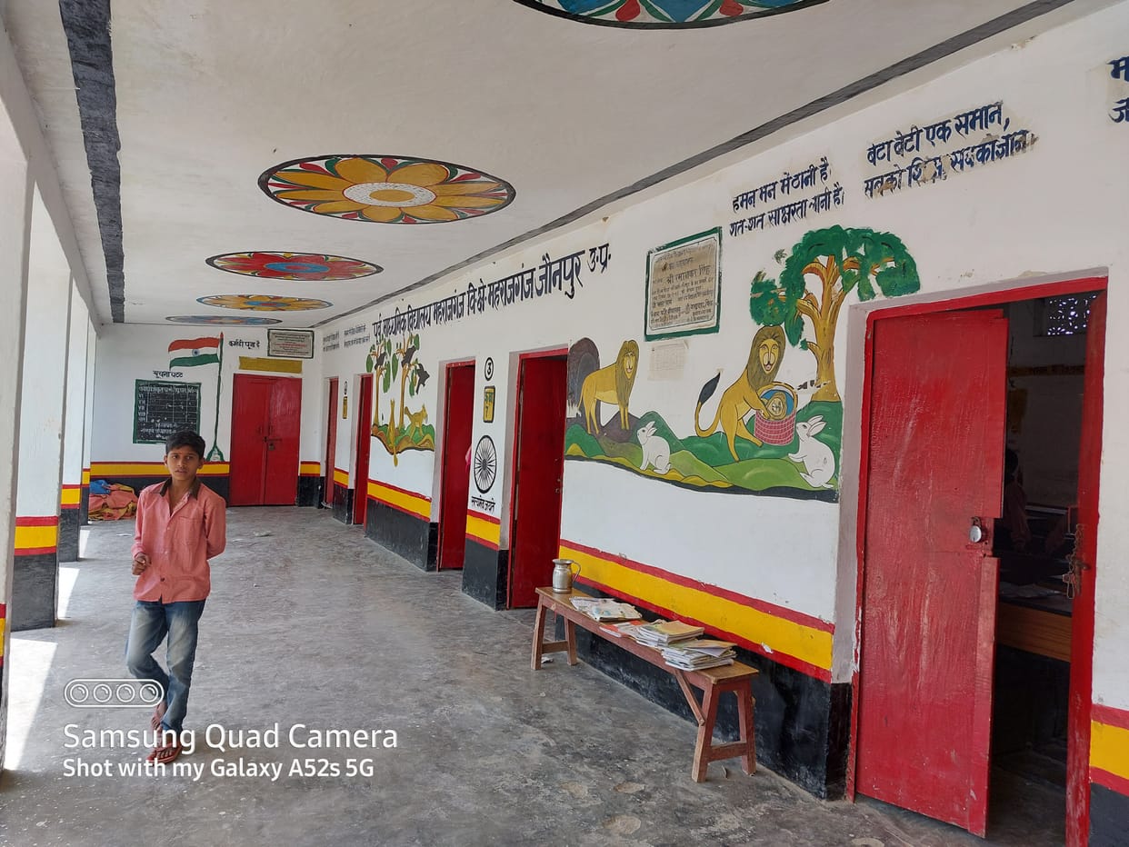 Wall paintings and colorful flowers decorated in beds are attracting people
