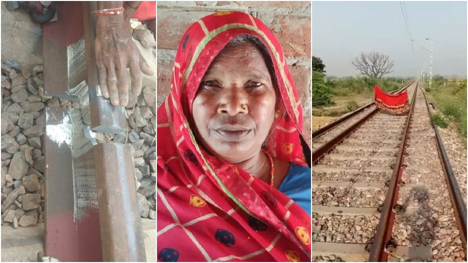 woman wearing red sari stopped the train after who  seeing the broken track in etah