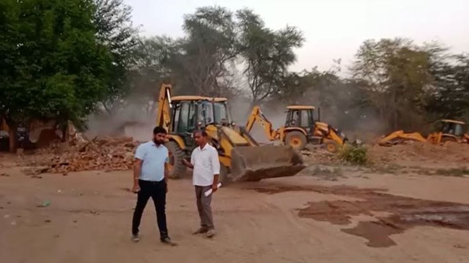 Samajwadi Party leader brick kiln demolished by bulldozer in Etah