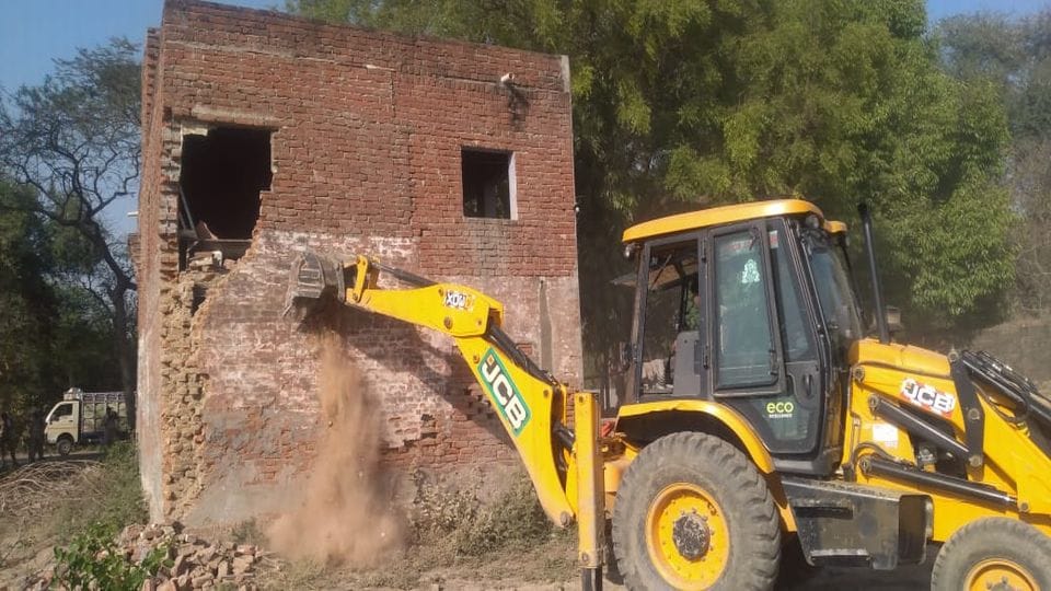 Samajwadi Party leader brick kiln demolished by bulldozer in Etah