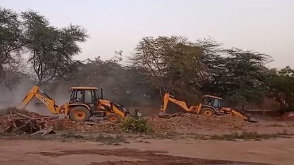 Samajwadi Party leader brick kiln demolished by bulldozer in Etah