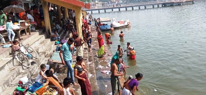 Devotees take a dip in the Ganges on Chaitra Amavasya