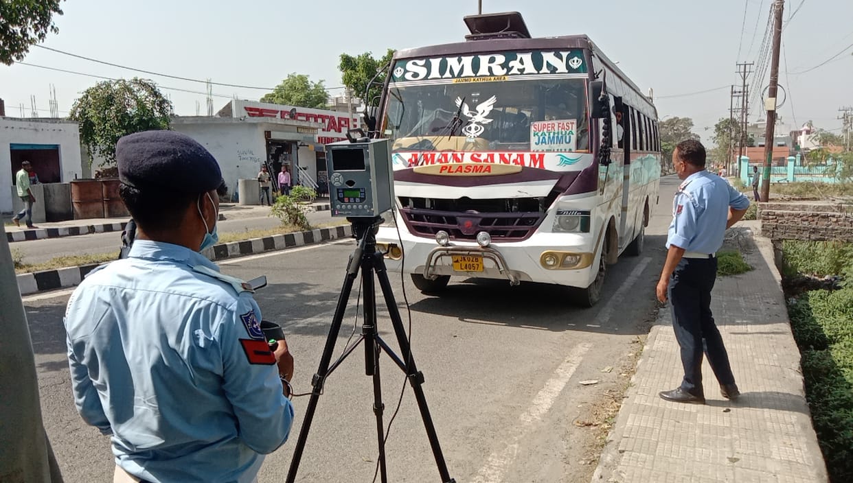 Speed of vehicles measured by speedgun, action
