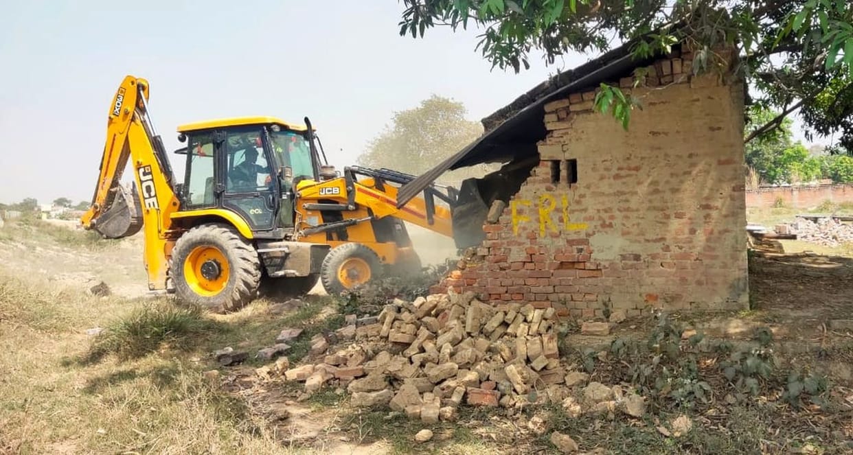 Bulldozer on illegal occupation of government land