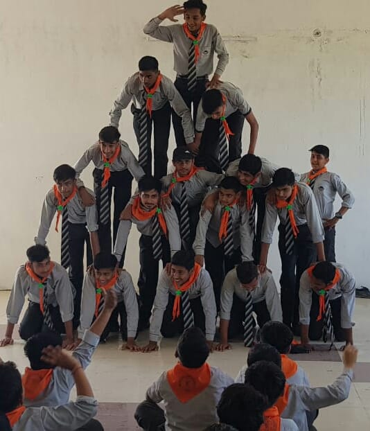 Taught children tricks in scout guide camp