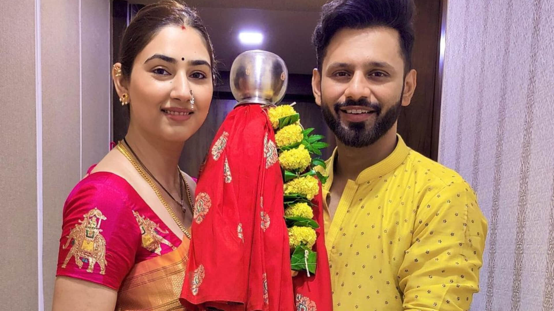 disha parmar stuns in satin blue shirt with distressed shorts husband rahul vaidya give reaction