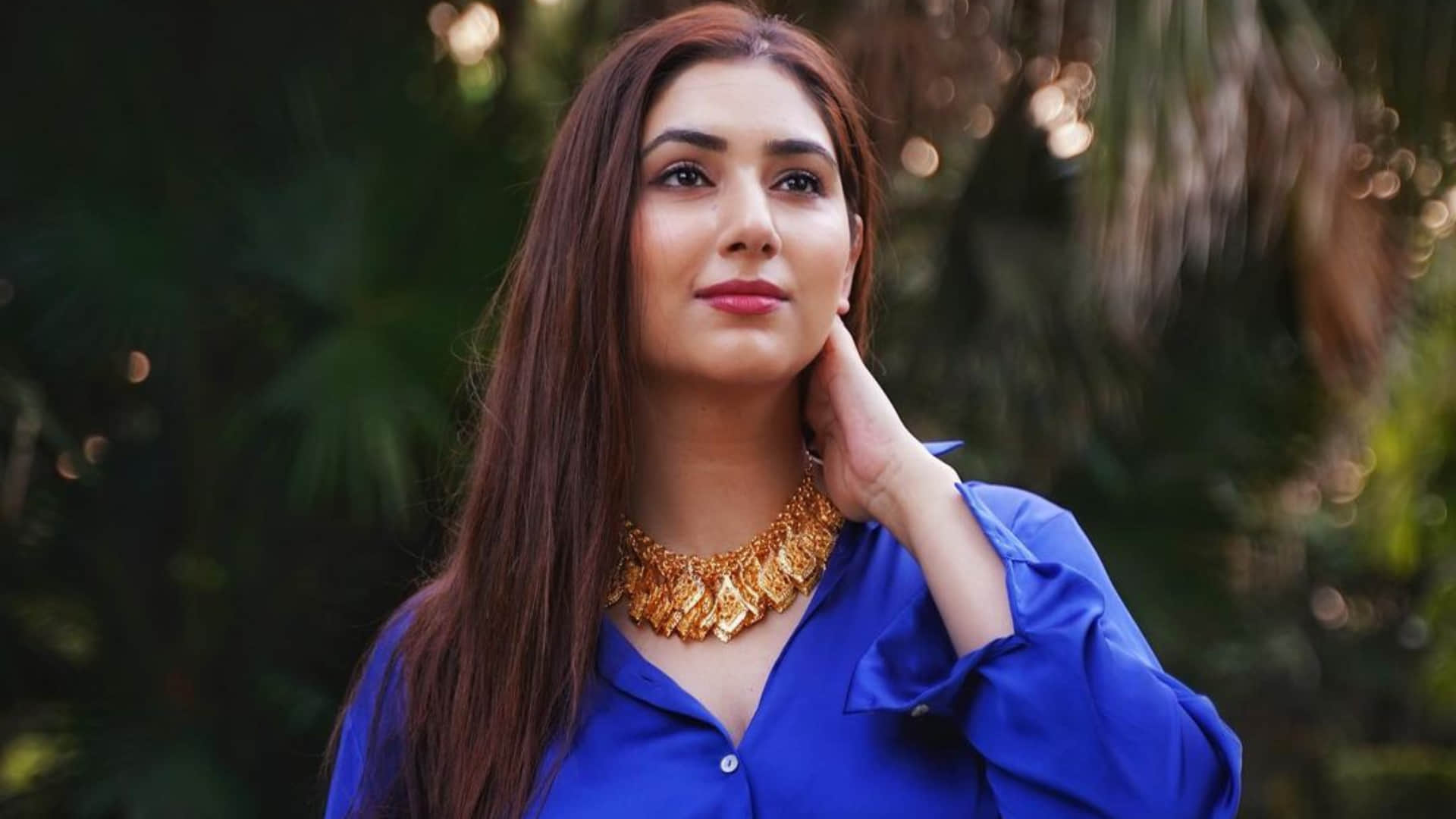 disha parmar stuns in satin blue shirt with distressed shorts husband rahul vaidya give reaction