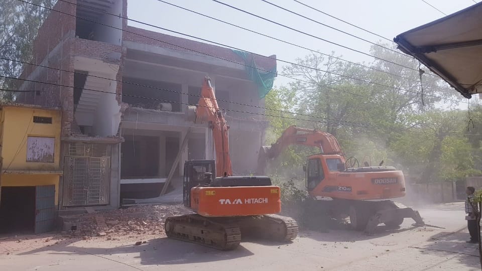 Bulldozer run on illegal properties in Etah UP News