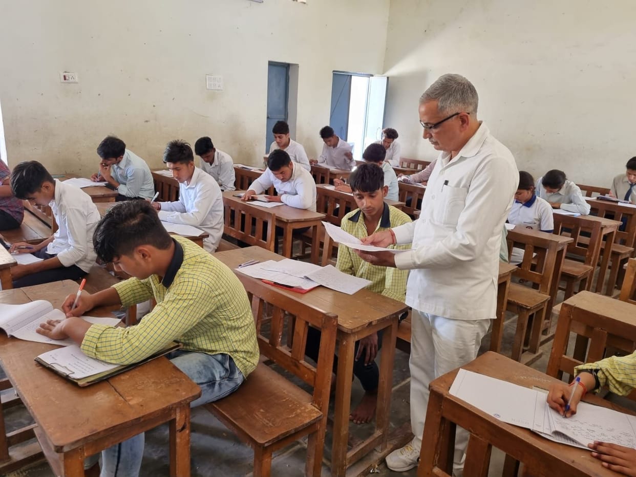 Two students had changed the answer book, slips were found with two, two supervisors relieved