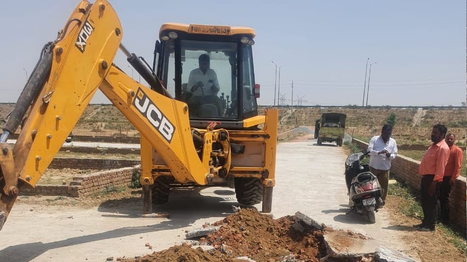 Bulldozers run on illegal colony being built near Inner Ring Road in Agra