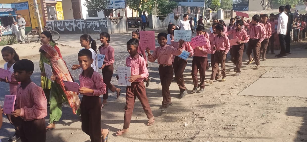 Rally taken out for 100% enrollment in schools