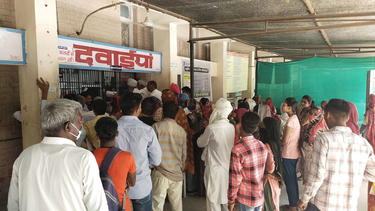 Ruckus of patients outside the dispensary, patients in line for hours for medicine