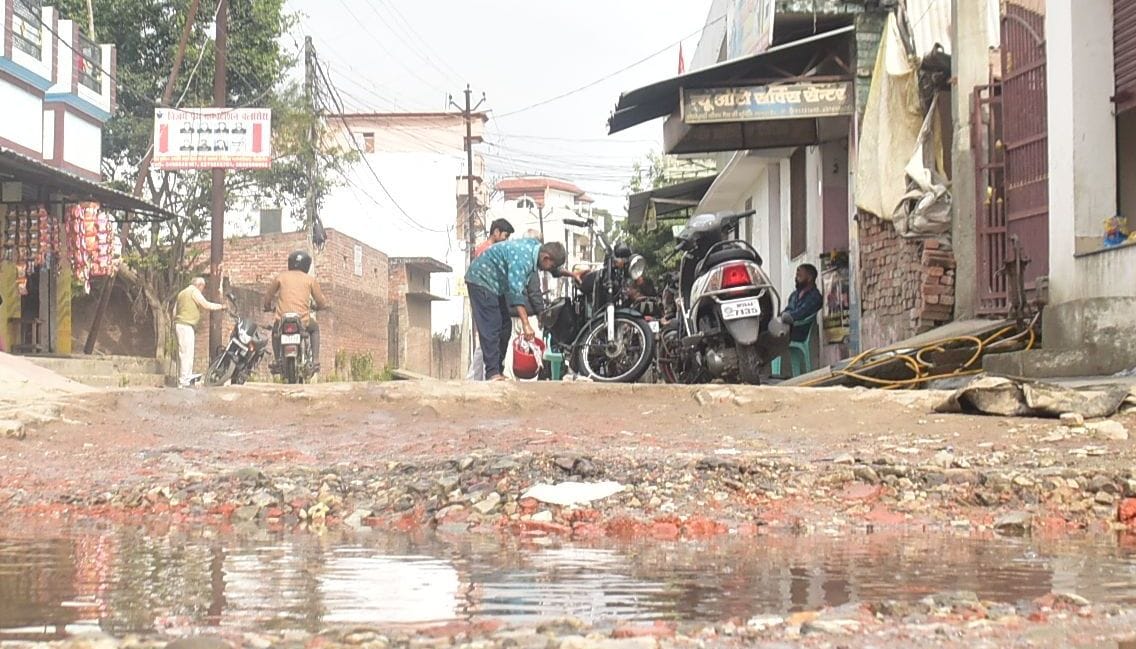 Pebbles are pricking the feet of the townspeople, broken roads