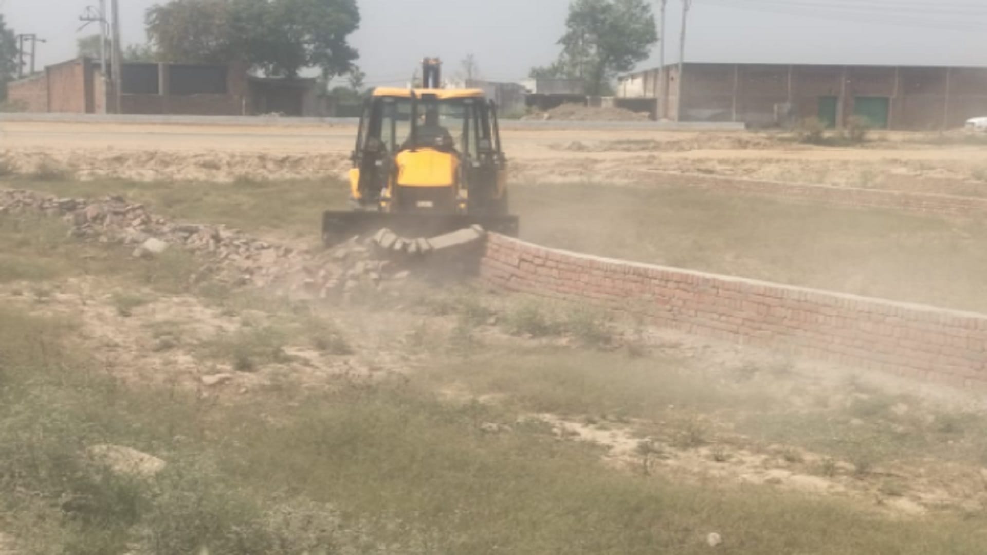 UP News: Administration officers have demolished 25 bigha land by bulldozer in Shamli see photos