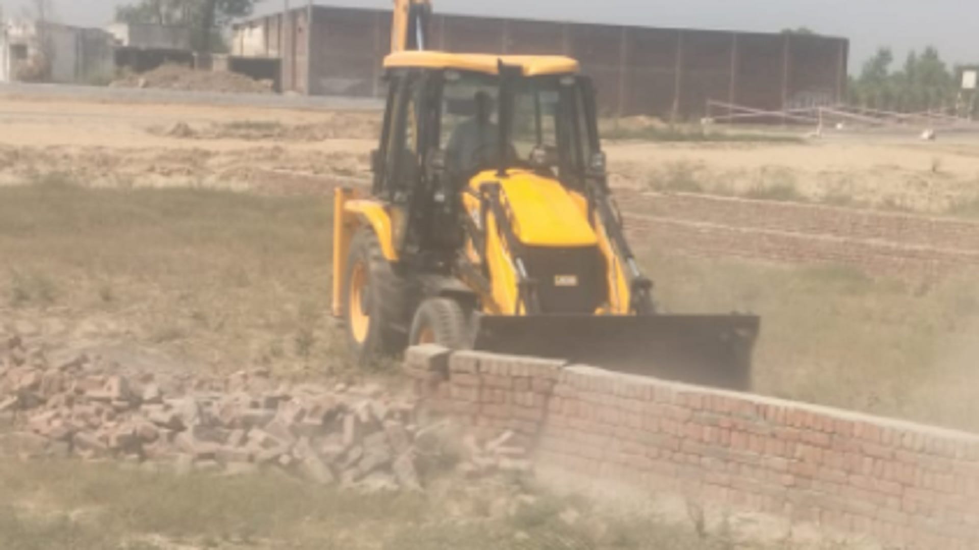 UP News: Administration officers have demolished 25 bigha land by bulldozer in Shamli see photos