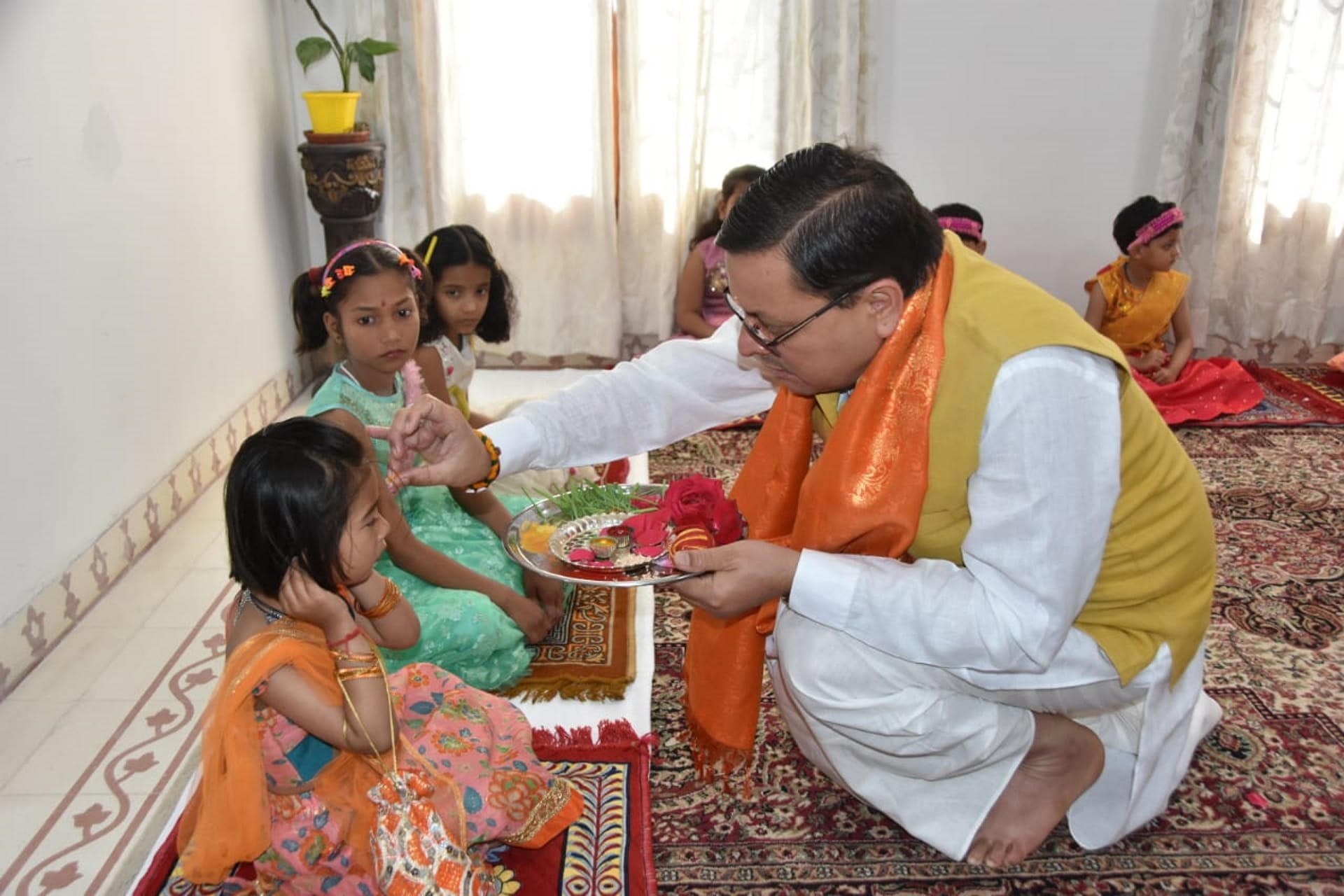CM Pushkar Singh Dhami performs Kanya Pujan at his residence