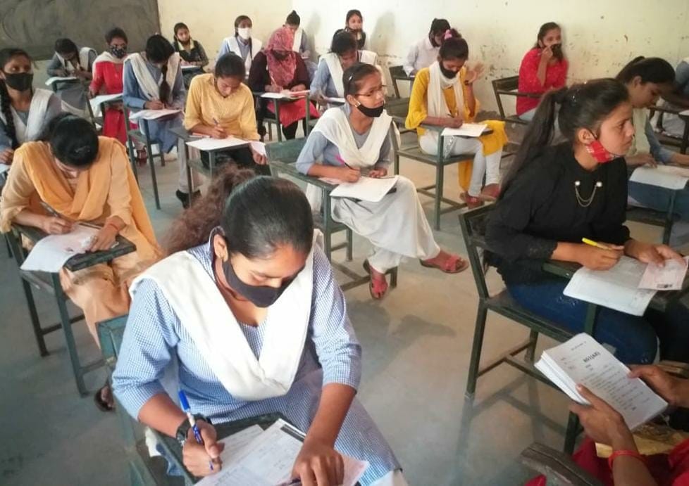 The teacher was giving the chemistry exam instead of the student