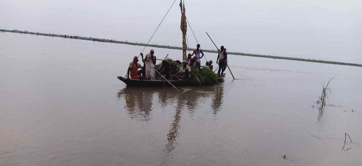 farmers go to farm by boat