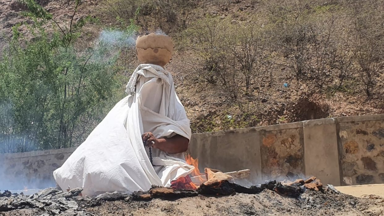 Amidst the scorching heat in Barmer baba is doing sadhna with a burning pot on his head middle of fire
