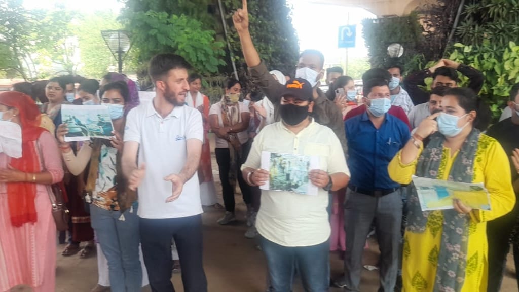 NHM Employees Protest in GMC Jammu Demand Revocation Of Termination Order