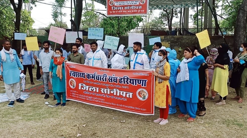 Removed contract health workers took out procession wearing PPE kit, condition of three deteriorated